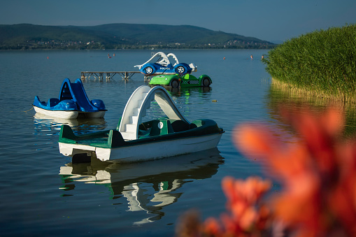 Boats and pedal boats on lake Balaton, Hungary