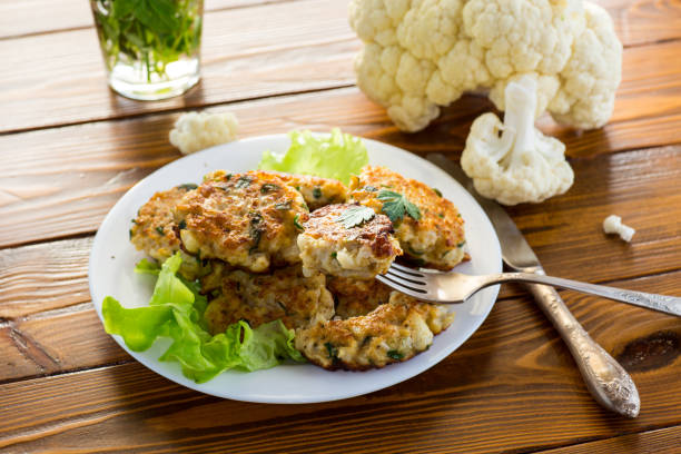 istock cooked vegetarian fried cauliflower cutlets, in a plate . 1806377990