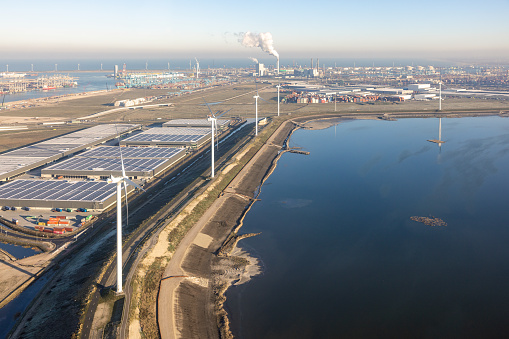 Maasvlakte Rotterdam, The Netherlands - December 14, 2022: Aerial view Industrial area Maasvlakte in the Port of Rotterdam. Chemical plant at the horizon.