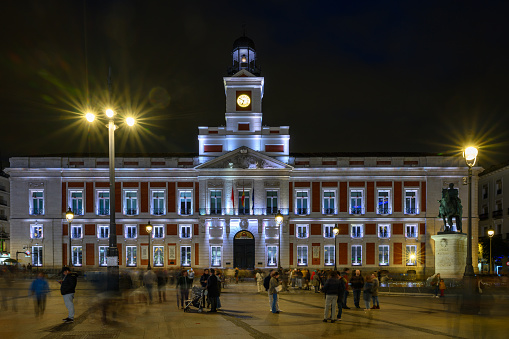 Puerta del Sol, a famous and bustling public square in Madrid, at night. Long exposure.