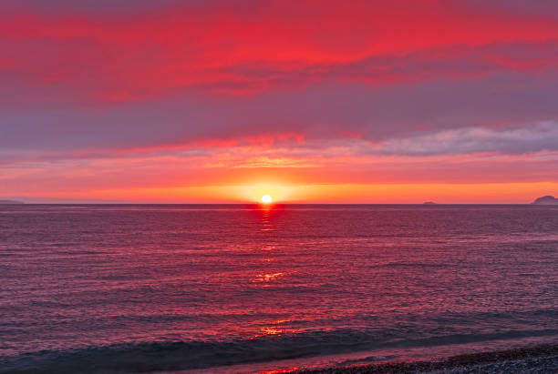 istock Sunset on a Remote Great Lake Shore 1806423439