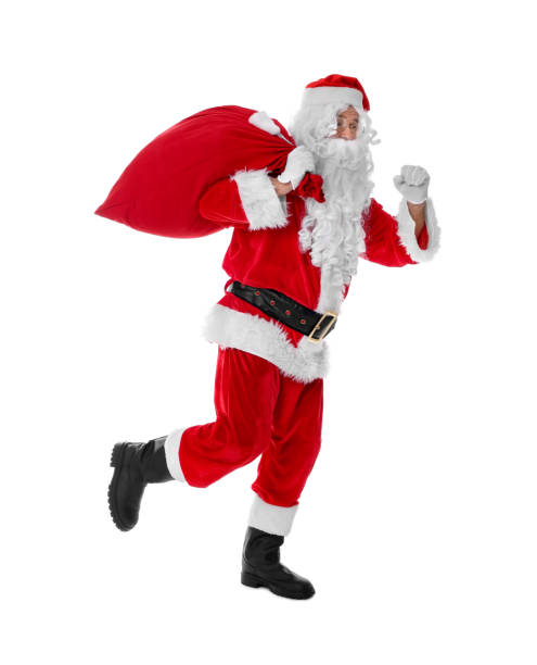 istock Man in Santa Claus costume with bag running on white background 1806438556