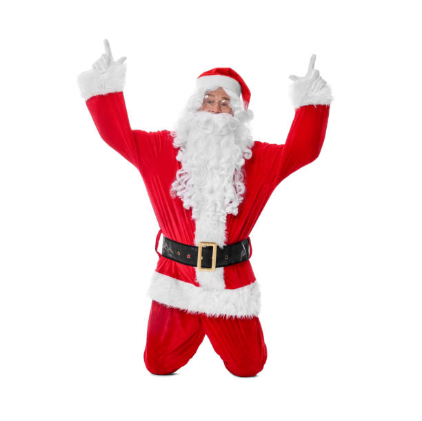 Man in Santa Claus costume posing on white background