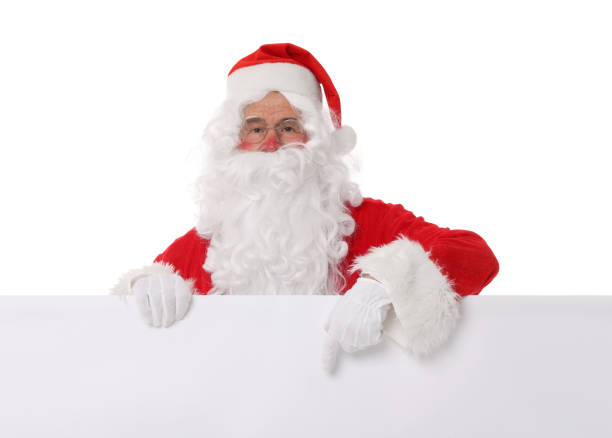 istock Man in Santa Claus costume posing and pointing on white background 1806439162