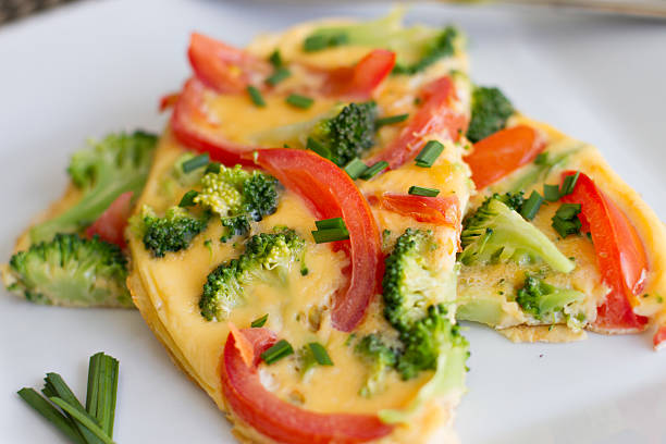 Broccoli and Tomato Omelette (omelet) stock photo