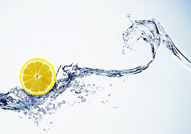 istock lemon in spray of water 180648770