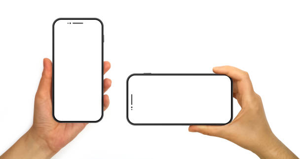 istock Hands holding mobile phone mockup. Blank smart phone screens isolated on white background. 1806496467