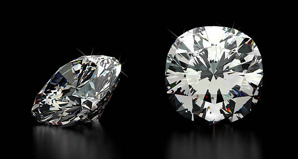 istock Two cushion cut diamonds in black background 180652723