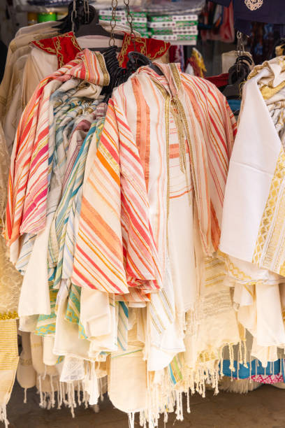 istock Traditional women's dresses in the Tunis souk. 1806566657