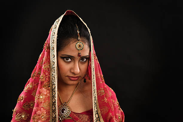 istock Indian woman in traditional sari 180657237