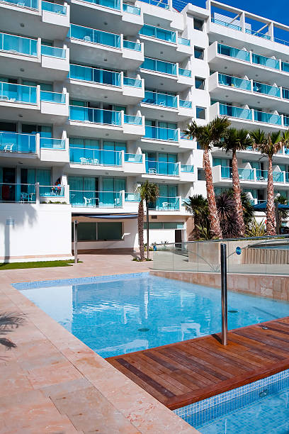 istock sunny lounge near the pool 180660874