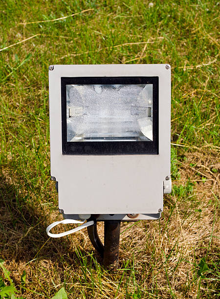 istock modern electric lamp on city  park field 180663208