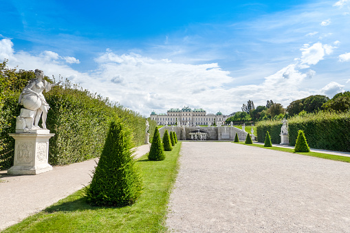 Vienna, Austria - September 10, 2012: Tourists visit the magnificent gardens of Schonbrunn Palace, one of the most significant cultural and naturalistic landmarks not only in Vienna but in whole Austria.