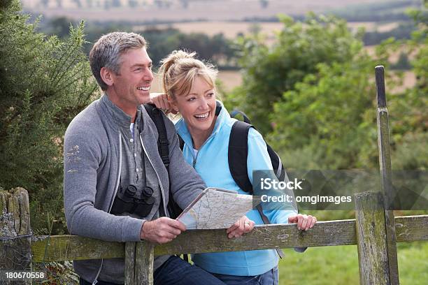 Mature White Couple On A Walk In The Country Stock Photo - Download Image Now - Mature Couple, Hiking, Couple - Relationship