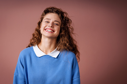 Happy smiling young positive thinking woman portrait