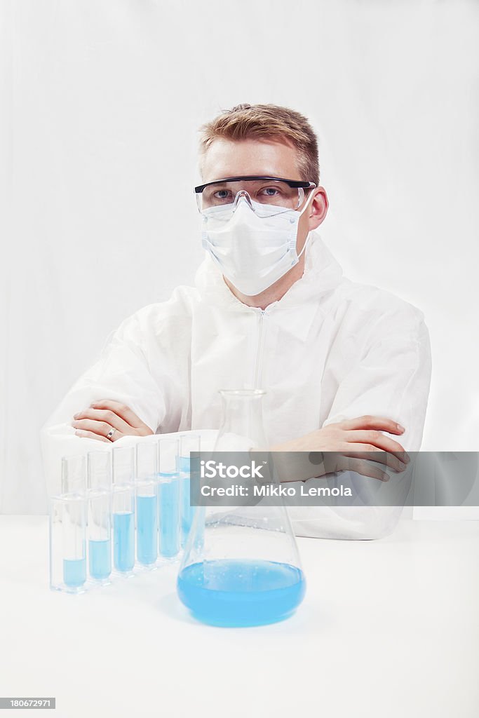 Chemist portrait Portrait of a chemist wearing protective clothes Adult Stock Photo