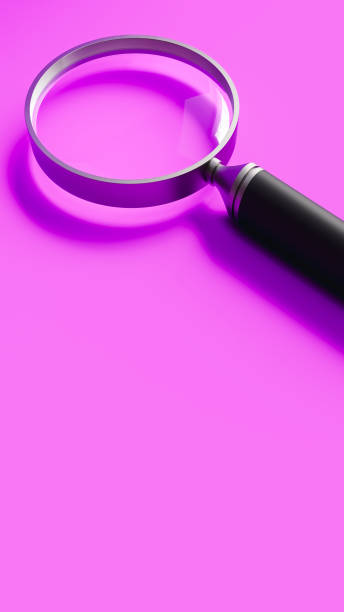 istock Magnifying glass on top on purple stage, focus and search theme, 3d rendering 1806783925