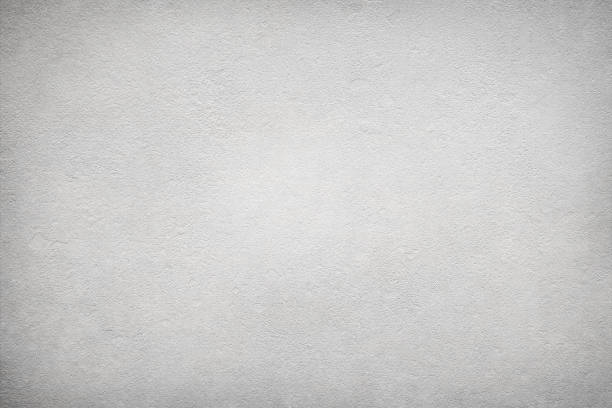 istock Texture of gray polished concrete background. Light plaster wallpaper with rough cement texture. Empty grunge wall concept or floor backdrop. Abstract surface mockup. Top view, close up, copy space 1806815500