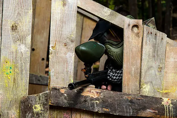 Photo of Players in paintball prepare for fight