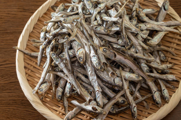 istock A pile of dried sardines on a bamboo colander 1806896598