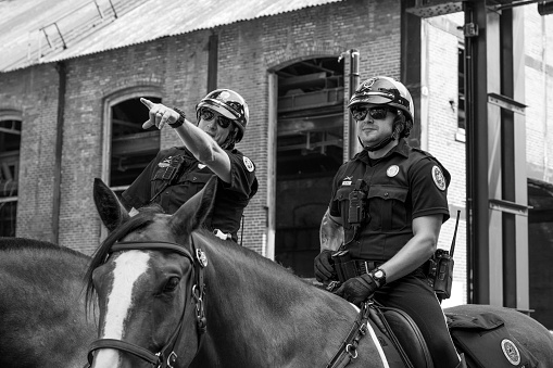 Bethlehem, USA - August 20, 2023. Policemen on horse on duty at SteelStacks on Lehigh Valley Pride day, Bethlehem, Pennsylvania, USA