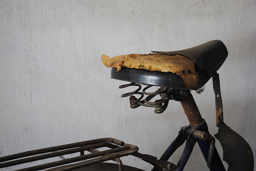 Broken saddle on the old bike.