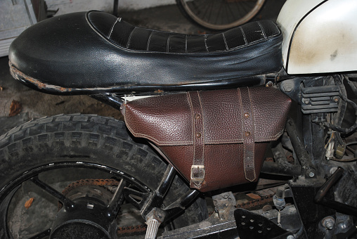 A simple custom leather motorcycle tool bag.