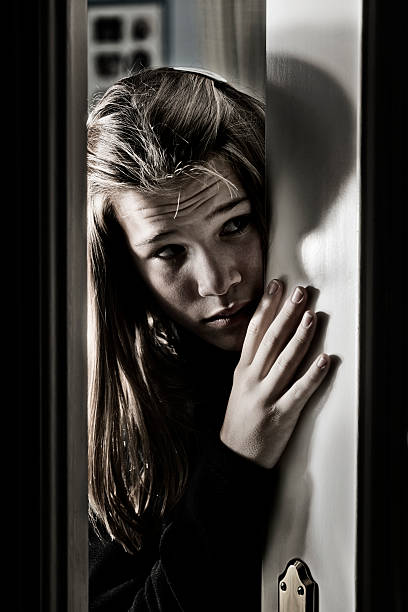 istock Girl at door 180694375