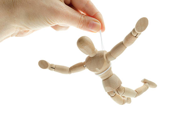 istock Wooden mannequin learning to fly 180694609