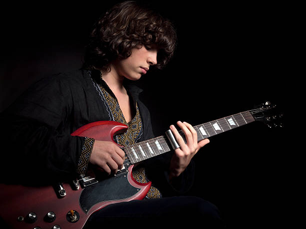 istock Teenager plays a guitar 180694756