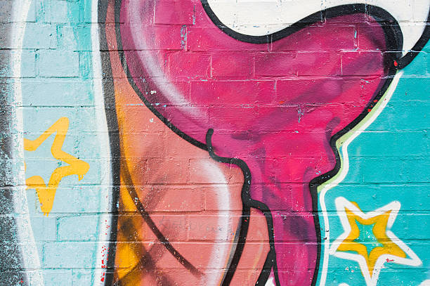 istock Detail of a grafitti on brickwall 180694896