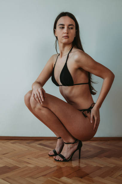 istock An attractive fashion model posing in bikini 1806949744