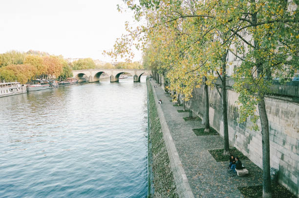 istock The river Seine with fall colored trees in Paris france 1806951851