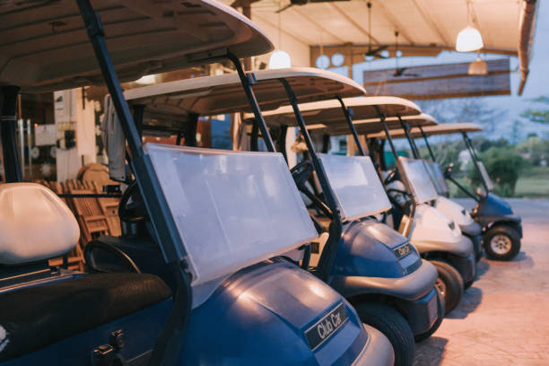 istock row of golf cart parking in golf course garage 1806952402