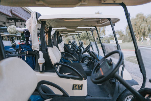 istock row of golf cart parking in golf course garage 1806952414