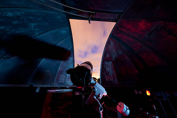 Within an observatory A telescope in a domed observatory at the Norman Lockyer Observatory, Sidmouth, UK observatory photos stock pictures, royalty-free photos & images