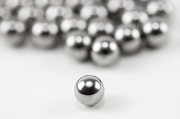 Chrome Balls Chrome Balls Isolated Over White Background ball bearing photos stock pictures, royalty-free photos & images