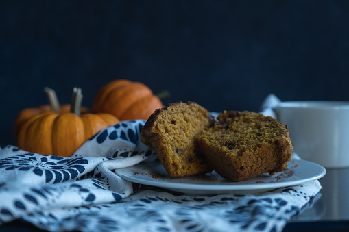 Closeup view of pumpkin muffin and coffee cup. in United States, District of Columbia, Washington
