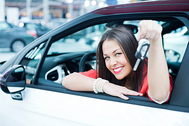 istock Young woman sitting in car 180697063