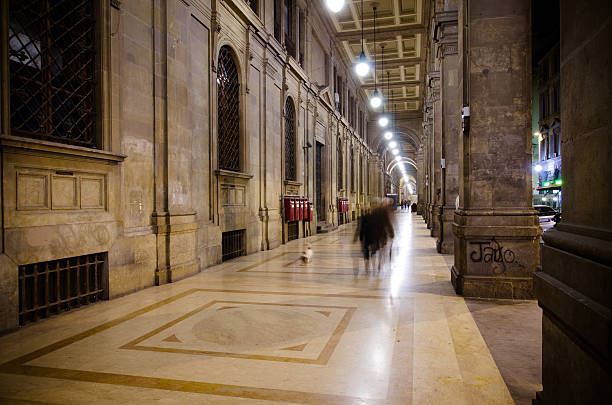 People walking in the city by night