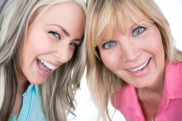 istock laughing mother and daughter 180697680