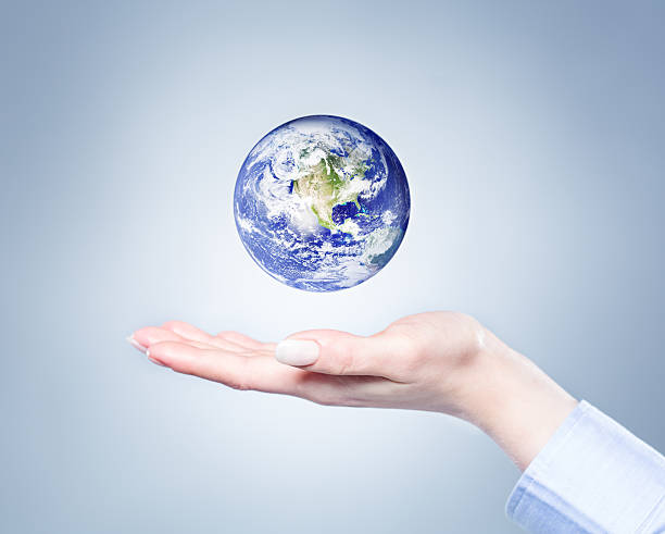 istock Woman holding planet earth 180697930