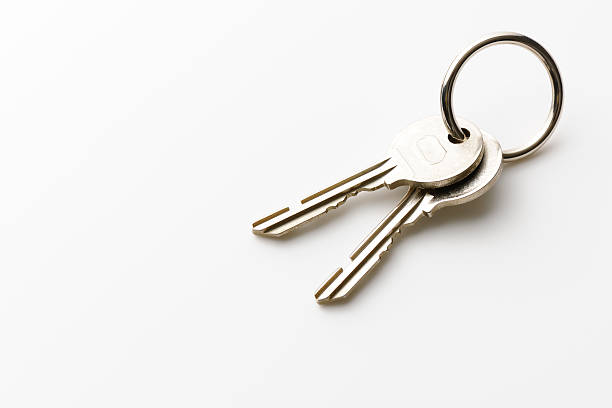 istock Isolated shot of house keys on white background 180698603