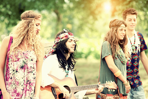 Hippies having fun together. Vintage look.\u2028http://www.massimomerlini.it/is/lifestyles.jpg