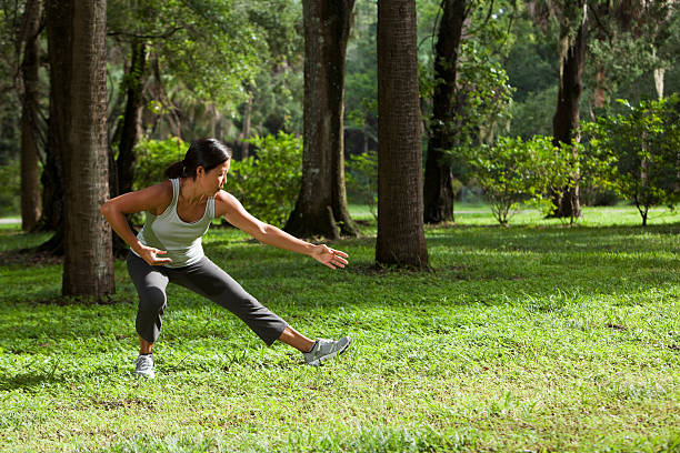 istock Asian woman practicing tai chi 180698951