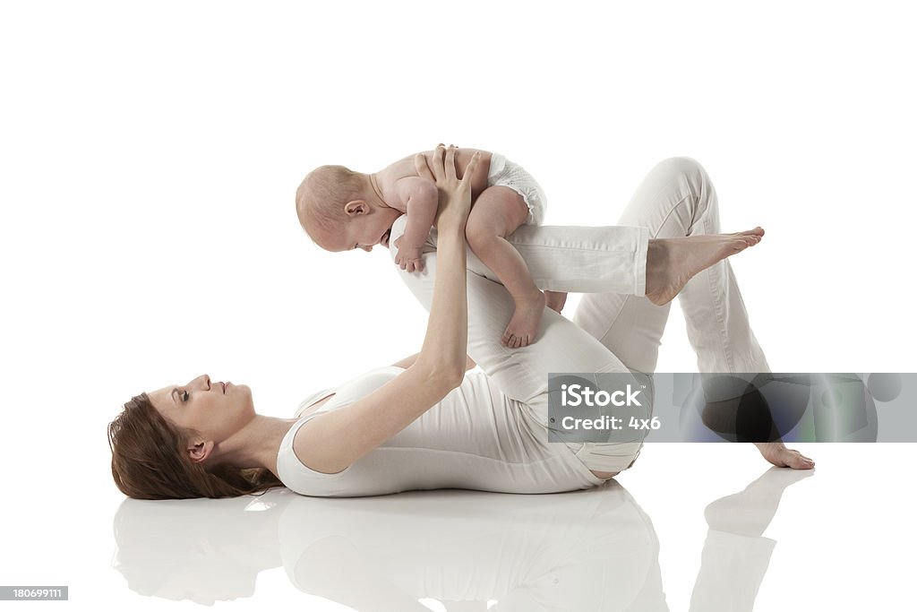 Verspielte Mutter mit Ihrem baby - Lizenzfrei 12-17 Monate Stock-Foto