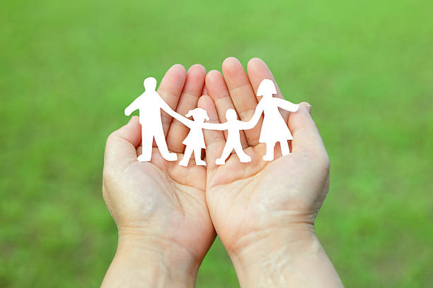 istock Paper family in hands 180699566
