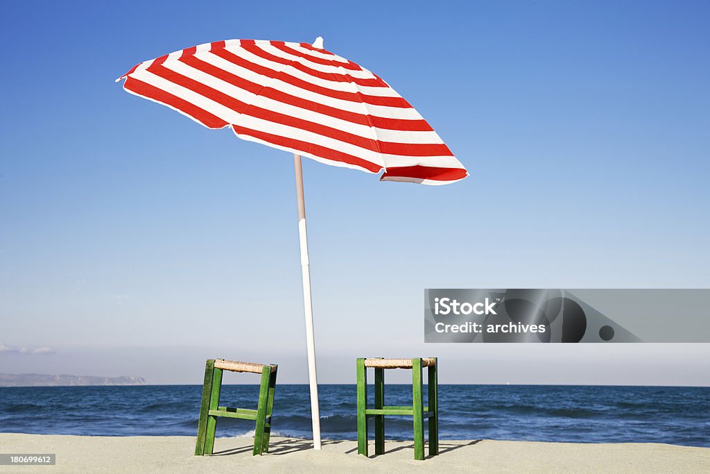 Sonnenschirm Strand-Landschaft - Lizenzfrei Gestreift Stock-Foto