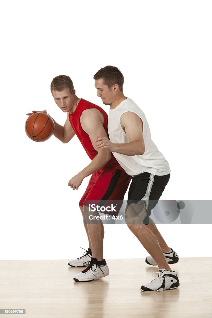 Joueurs de basket en action - Photo de Activité libre de droits