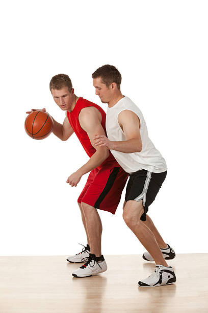 istock Basketball players in action 180699758
